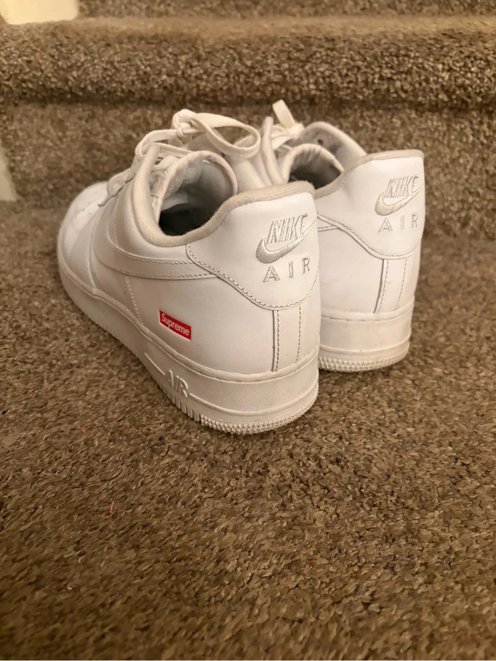 Nike White Low-Top Sneakers with Small Red Accent